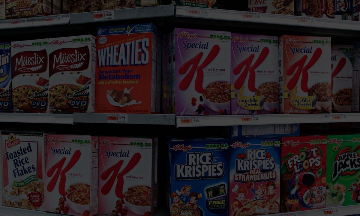 Kelloggs cereals in grocery story darkened image