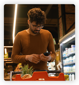young man shopping for grocieries