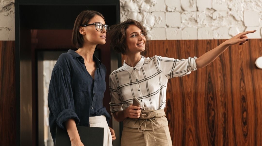 two women working on agile research methodology strategy